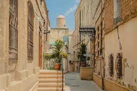 Maiden Tower seen from a historic street in Baku Old City