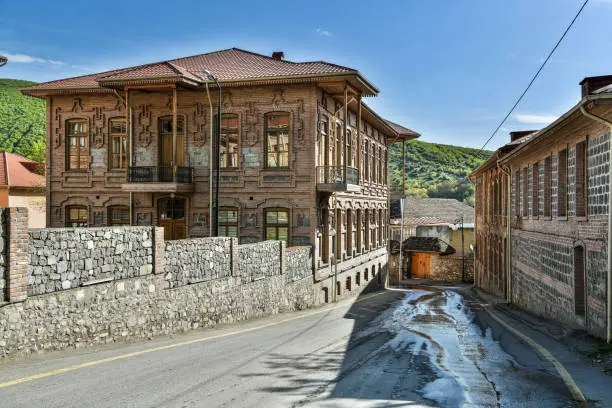Historic stone houses along a street in Lahij